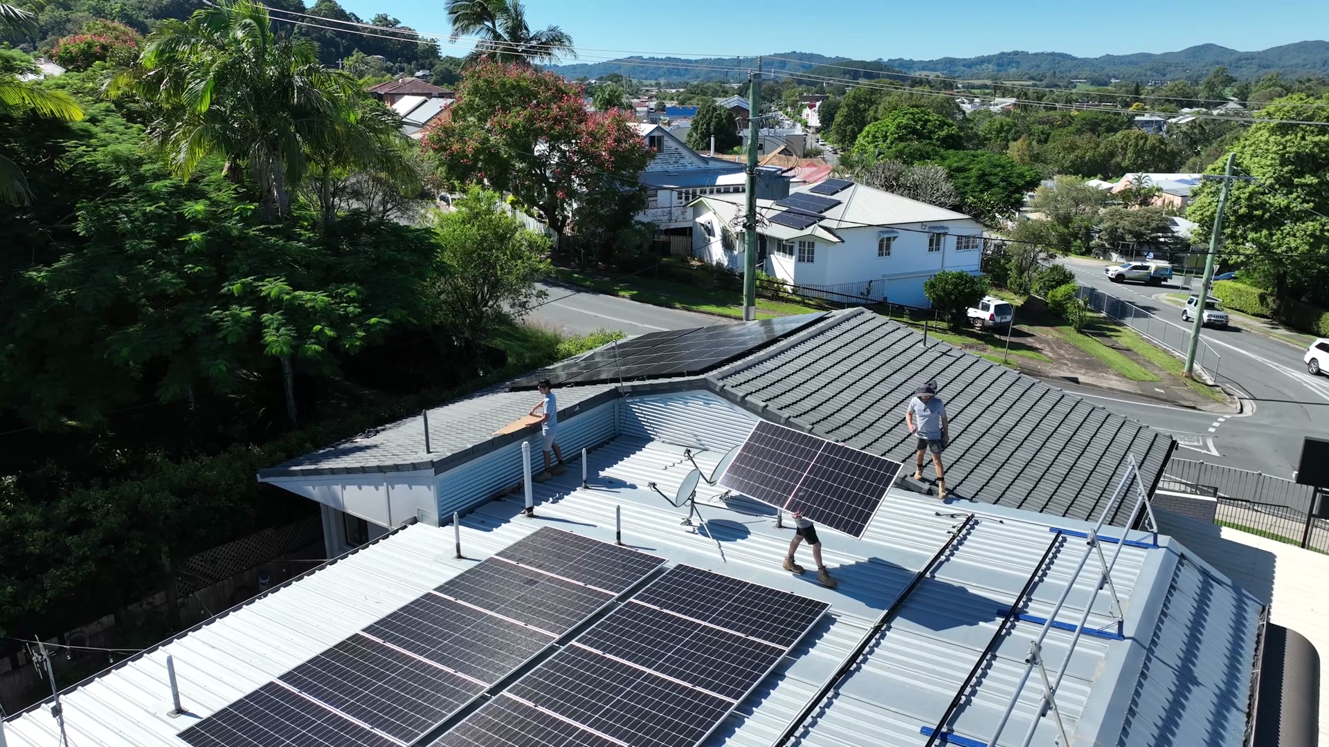 Drone view of ProSolar electricians installing solar panels