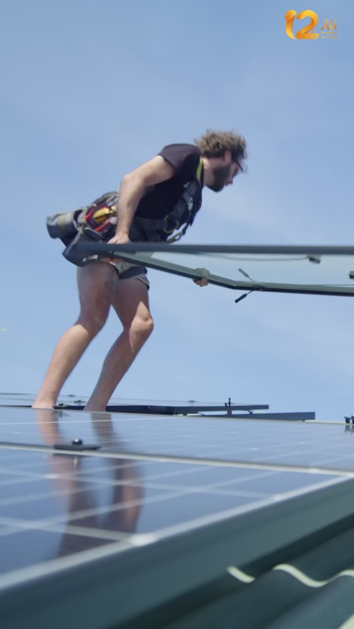 ProSolar electrician fitting solar panels on the Byron Bay Community Centre roof, video preview